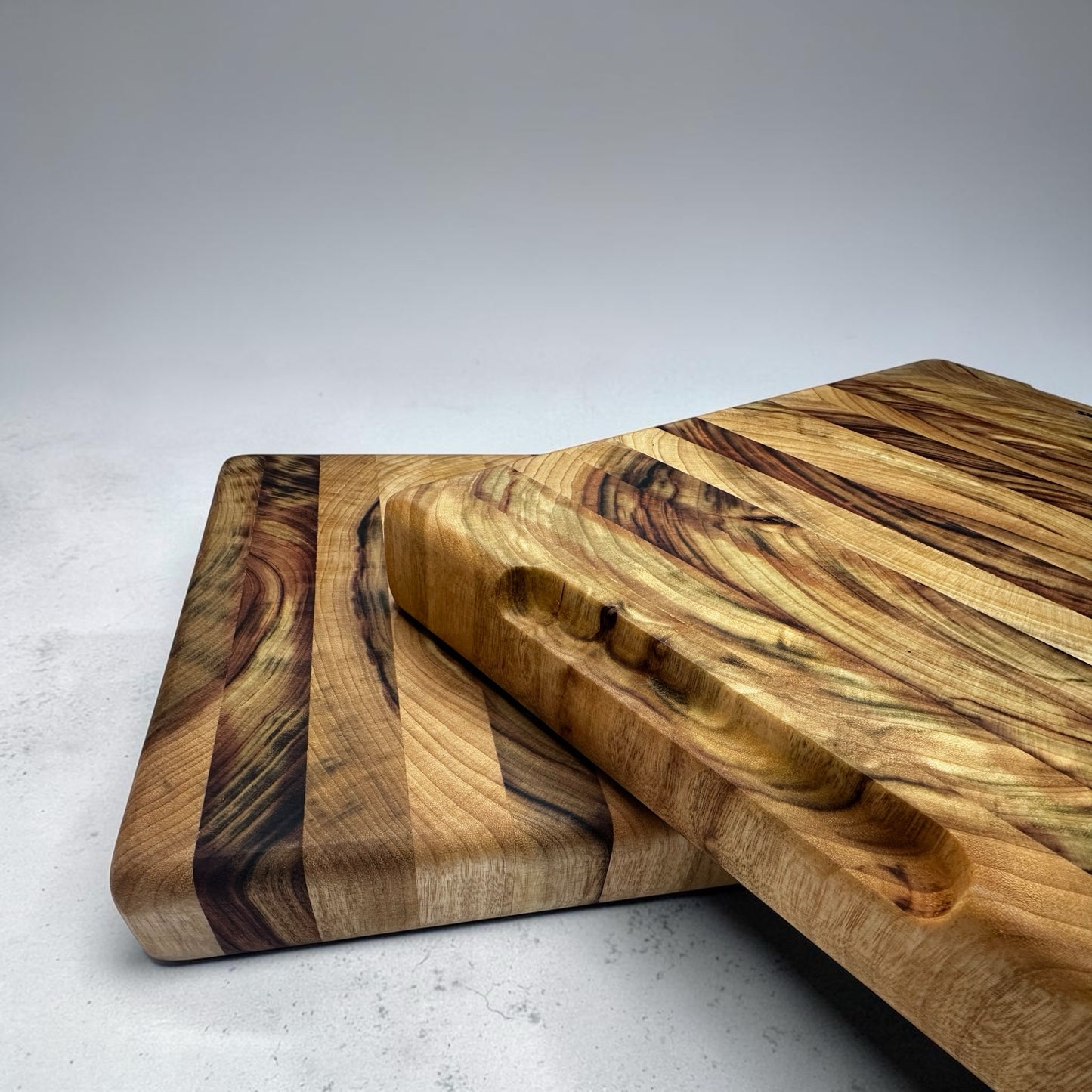 Fab Slabs Online Store premium hardwood chopping board with unique timber grain and integrated side handles