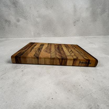 Fab Slabs Online Store premium Australian hardwood chopping board with a natural striped timber grain pattern.